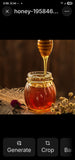 Glass jar of honey with honey dipper dripping honey.
